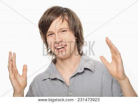 Nice Young Boy Smiling And Showing His Emotions By Hands