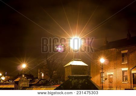 The Bright Lights At Night In The Market Square