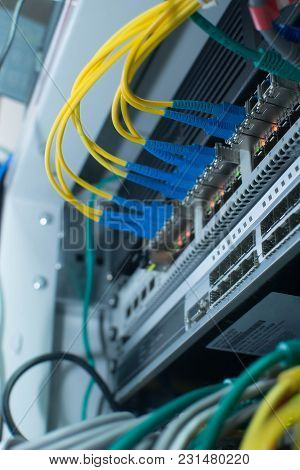 Fiber Cables Connected To Switch In A Datacenter.