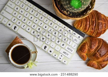 Vintage Coffee Cup With Espresso On A Saucer, Croissant, Biscuit, Green Orchid Flower, Cactus In The