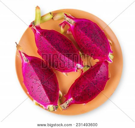 Red Dragon Fruit  On The Plate Isolated On White