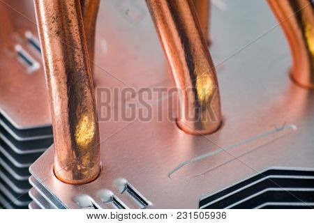 Aluminum Radiator With Copper Heat Pipe Close-up With Beautiful Bokeh Metallic Background