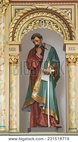 SISAK, CROATIA - DECEMBER 07: Statue of Saint Paul on the main altar in the Church of Holy Cross in Sisak, Croatia, on December 07, 2017.