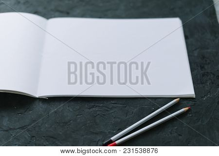 Notepad With Pencils Mocap. Place For Text.