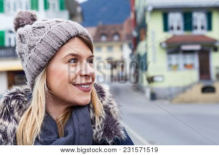 Portrait Of Attractive Young Female Toursit In Interlaken, Switzerland - Exploring The City