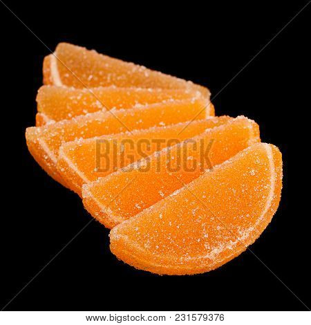 Marmalade As Orange Clice Isolated On Black Background