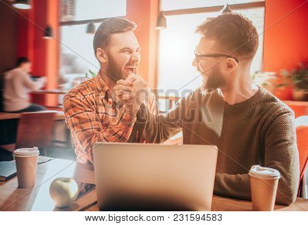 Amasingly Happy Hipsters Are Screaming And Yelling On Each Other. They Look Cheerful And Wonderful