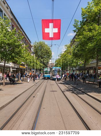 Zurich, Switzerland - 24 April, 2014: View Along Bahnhofstrasse Street. Bahnhofstrasse Street Is The