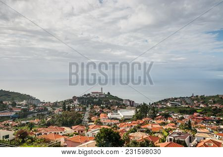 Funchal, Portugal - December 10, 2016: View From The Mountain Over The Rooftops Seafront Houses On F