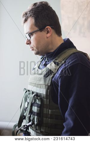 Photo Of Soldier In Safety Glasses And Armor