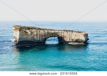 London Bridge, Limestone Stacks In The Ocean At Port Campbell National Park, By The Great Ocean Road
