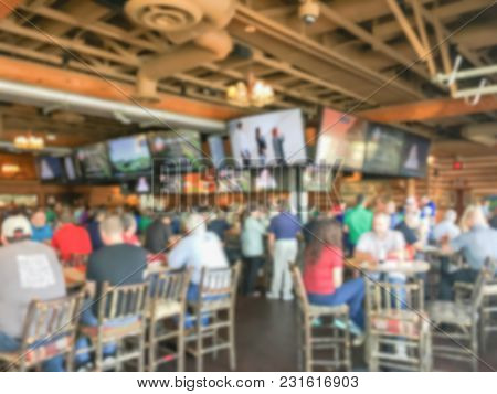 Blurred People At Sports Bars And Restaurants In America