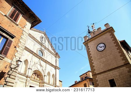 Medieval Houses And  Pulcinella Tower With Clock In Montepulciano,tuscany, Italy