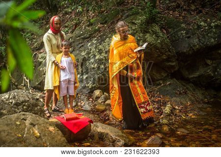 KOH CHANG, THAILAND - MAR 9, 2018: During Christian sacrament of spiritual birth - Baptism. There are currently 10 Orthodox parishes in Thailand, Orthodoxy is practiced by 0.002% of population.