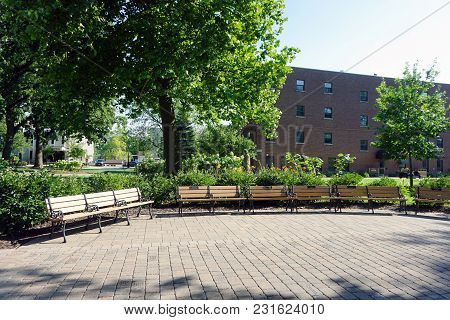 Joliet, Illinois / United States - July 27, 2017: People May Sit On Benches, On The Quad At The Univ