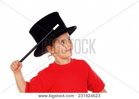 Pretty little girl doing magic with a top hat and a magic wand isolated on a white background