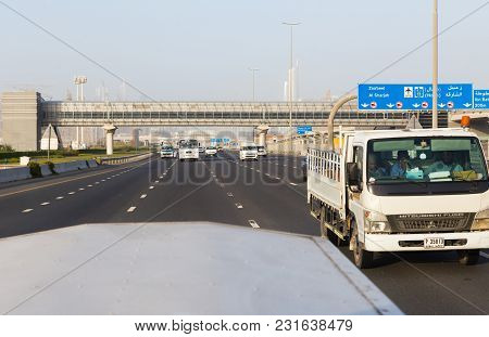 Dubai, Uae February 20, 2018: The Cars And Trucks On The Highway