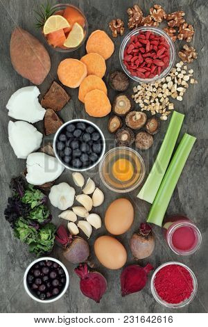 Health food to improve brain power with foods high in omega 3, antioxidants, anthocyanins, protein, vitamins and minerals.  With fruit, vegetables, seafood, smoothie, dairy and herbal medicine.