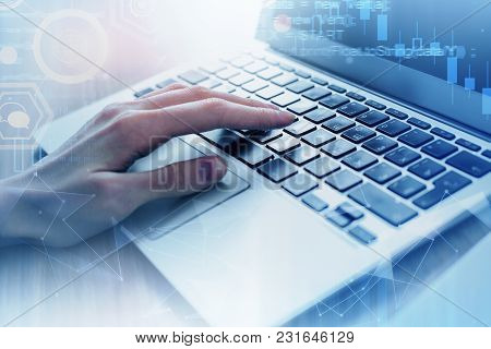 Hands Typing On Laptop Keyboard Placed On Abstract Background With Glowing Digtal Interface. Innovat