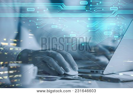 Hands Typing On Laptop Keyboard Placed On Abstract Background With Glowing Digtal Interface. Innovat