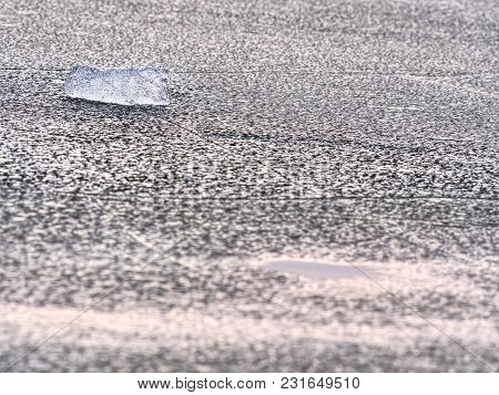 Climate Change. Icy Floes Mealtiing On Beach. Tourist Attraction Disappearing Glaciers. Ice On The B