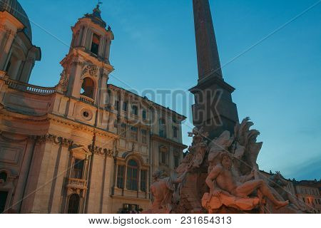 Italian Piazza Navona With Fountain Of The Four Rivers And Sant Agnese Church In Rome Outdoors