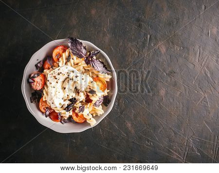 Tasty Italian Fusilli Pasta With Cherry, Mozarella Or Buratta Cheese And Fresh Basil. Dish With Past