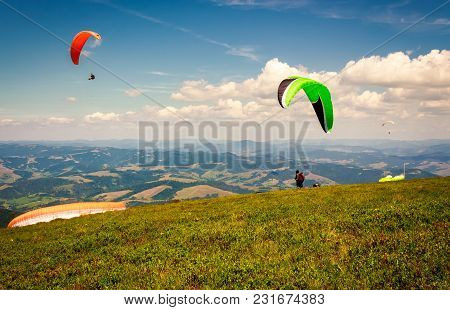 Skydiving  Flying Over The Mountains. Parachute Extreme Sport