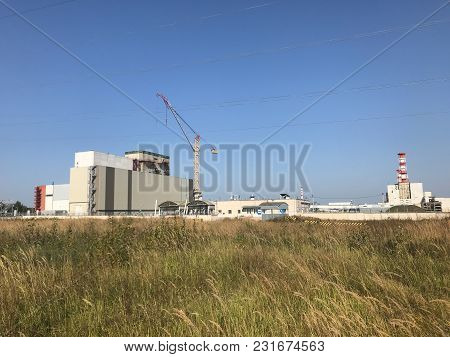 View Of Nuclear Power Plant. Nuclear Power Plant Located In The Town Of Desnogorsk. In The Foregroun