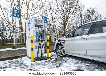 Limburg , Germany - February 11 2018 : Electric Filling Station Charging The Cars.