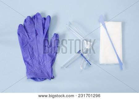 The Medical Plastic Tool For Holding Open The Vagina During Medical Investigation. An Overhead Photo
