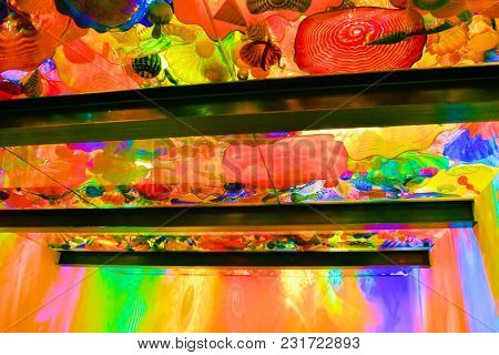 March 7, 2018 In Seattle, Wa:  Light Coming Thru A Ceiling With Glass Sculptures Creating Colorful L