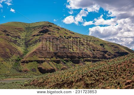 A Multi Colored Hillside In The Cottonwood Canyon Oregon.
