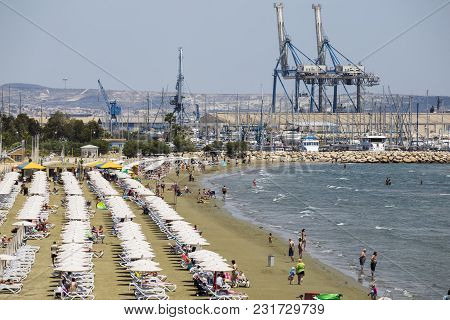 19 Of May 2016. Cyprus. Larnaca City,  Finikoudes Beach. Tourists Are Resting On The Coast. White Um