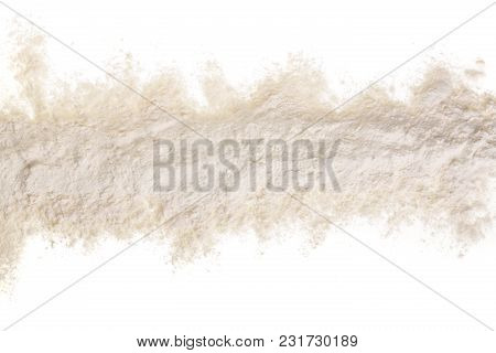 Pile Of Flour Isolated On White Background With Copy Space For Your Text. Top View. Flat Lay.