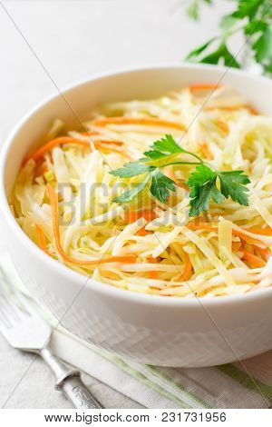 Fresh Coleslaw Salad In Bowl On Gray Stone Background.