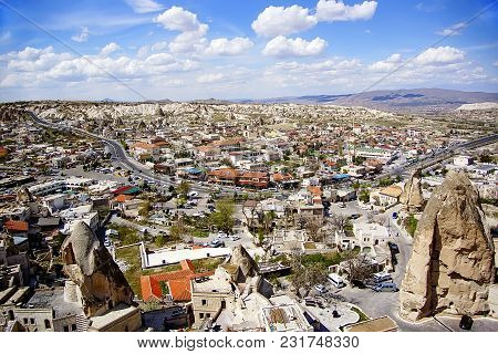 Top View On Mountain Village In Clear Sunny Day With Beautiful Clouds. Turkey, Cappadokia.