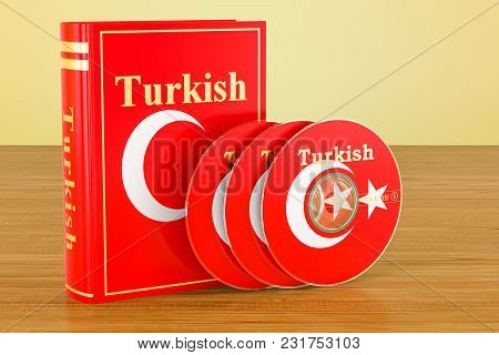 Turkish Language Textbook With Flag Of Turkey And Cd Discs On The Wooden Table. 3d Rendering