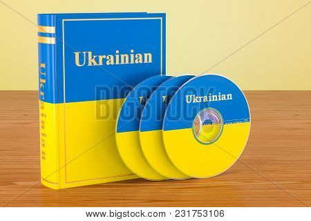 Ukrainian Language Textbook With Flag Of Ukraine And Cd Discs On The Wooden Table. 3d Rendering