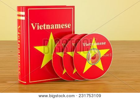 Vietnamese Language Textbook With Flag Of Vietnam And Cd Discs On The Wooden Table. 3d Rendering