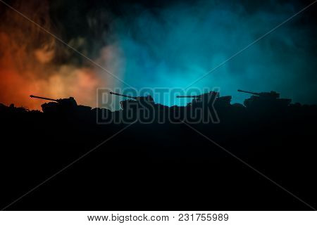 War Concept. Military Silhouettes Fighting Scene On War Fog Sky Background, World War German Tanks S