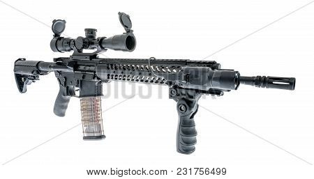 An Ar -15 With A Scope And Flashlight On An Isolated Background.
