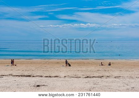 South Australia, Australia - November 13, 2017: People Relaxing On Seacliff Beach In Holdfast Bay, A