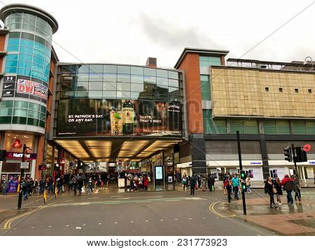 MANCHESTER, ENGLAND - MARCH 10, 2018: Pedestrians walking in the street at the Arndale Shopping Centre in Manchester, Northern England, UK.