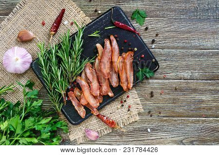 Basturma. Jerky. Pieces Of Meat With Red Pepper. Traditional Asian Meat Appetizer. Delicacy. Flat La