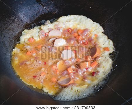 Tradition Omelet Mix Other Meat Cooking On Pan In Kitchen