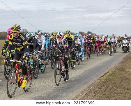 Fains-la-folie, France - March 5, 2018: The Peoton Riding On A Country Road During The Stage 2 Of Pa