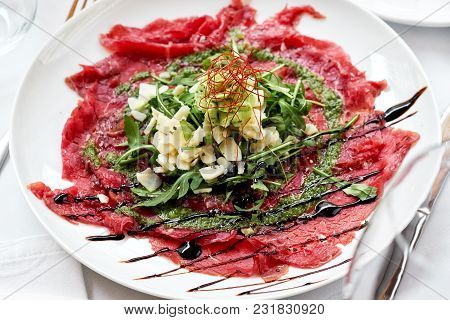 Meat Carpaccio Close-up. Restaurant Dish. No People