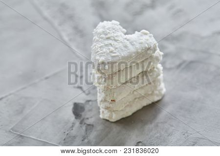 Sweet Crunchy Coconat Heart-shaped Biscuits Arranged In Pattern On Light Textured Background, Top Vi