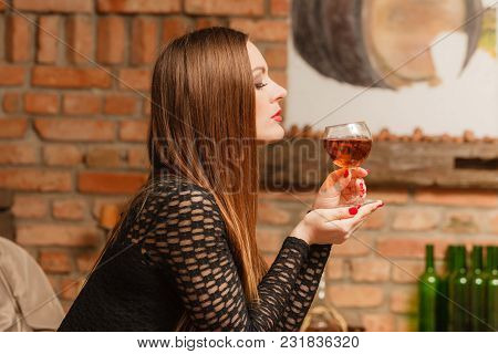 Elegant Beauty Lady Long Hair Full Make Up Wearing Black Dress Tasting Wine In Rural Cottage Interio